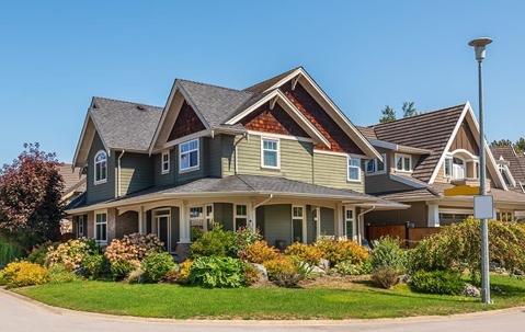 house with well-manicured front yard